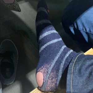 1 sock. Has a hole. Leg in photo not included